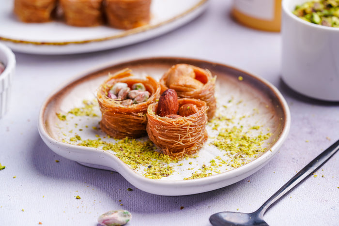 Dry fruit nest baklava filled with pistachio, almond and cashew