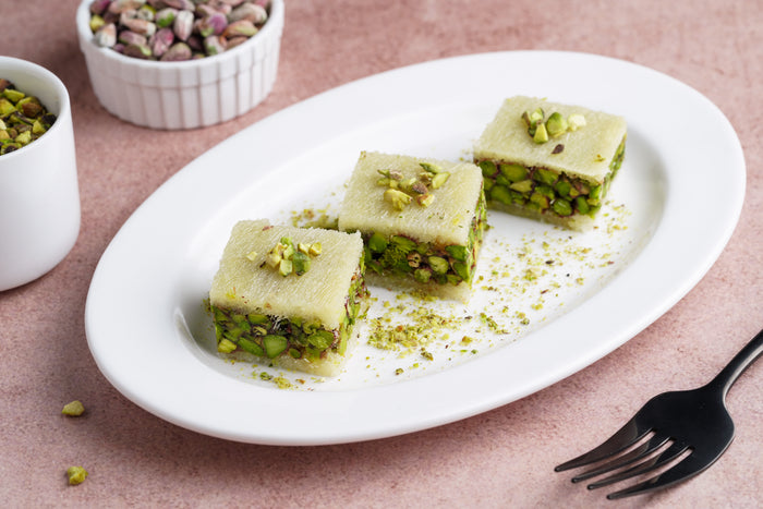 Pistachio Belloria squares on a white plate